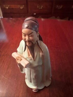 Vintage Shiwan Mud Man figurine of a scholar with scroll